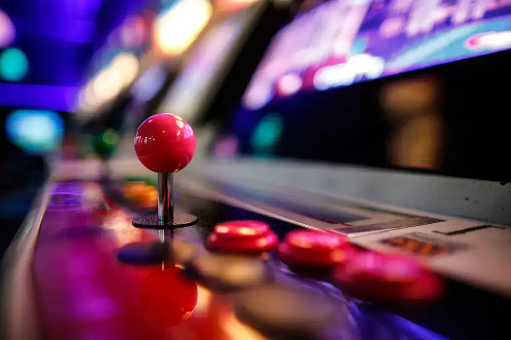 Glowing neon arcade machines ready for players