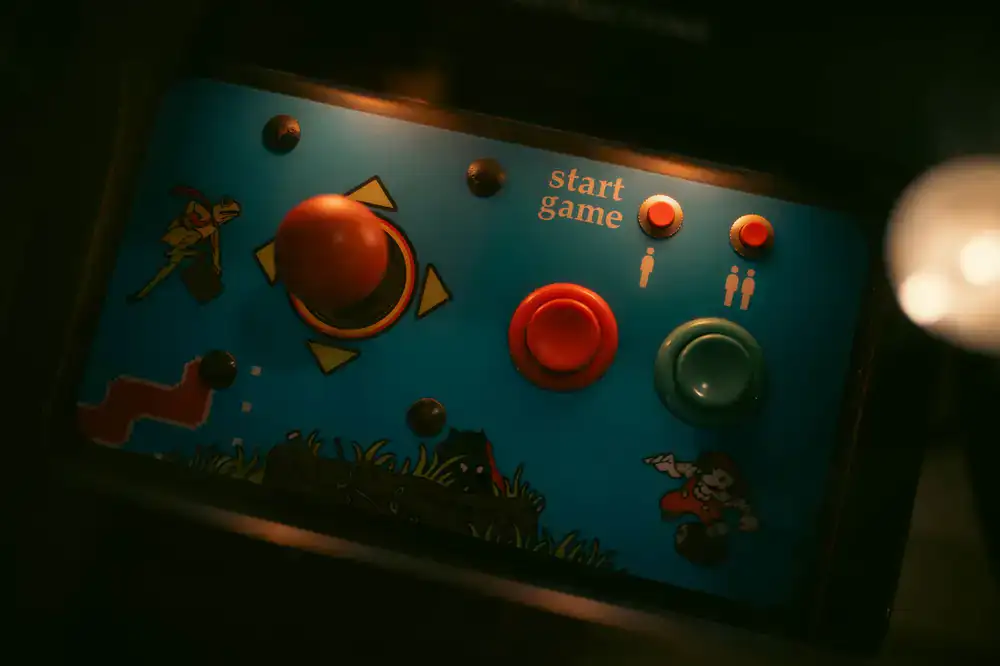 Players competing on modern arcade machines