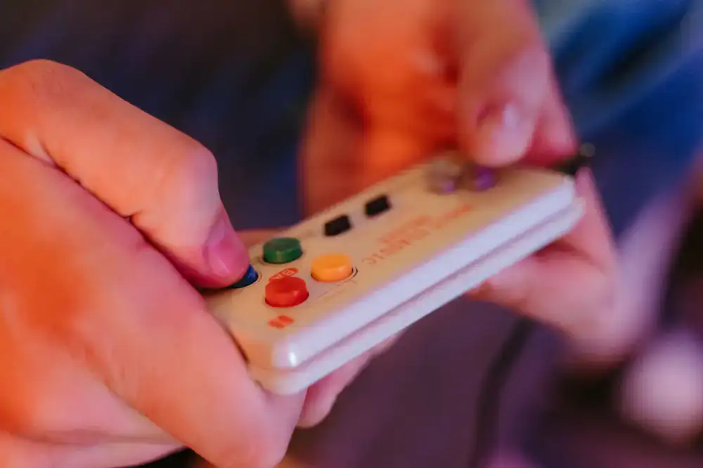 Player competing on a rhythm game pad